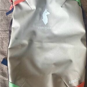 Cotopaxi Allpa 20L Backpack in Gray with Green and Red Highlights